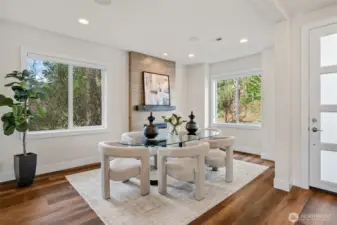 A versatile front flex room with its own gas fireplace offers endless possibilities