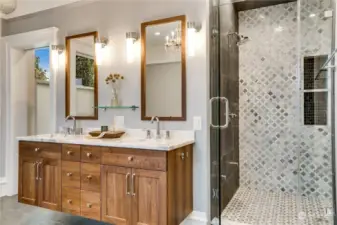 Dual vanities, steam shower, private water closet, and soaking tub make the perfect space to start and end your day!