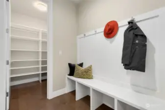 Behind kitchen wall is spacious mud-room & HUGE pantry!