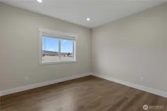 Second Bedroom giving plenty of room for a comfortable size bed or even an office.