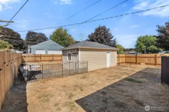 Side yard view with parking area.
