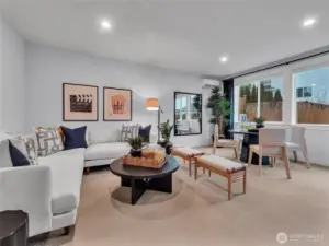 Lower level bonus room overlooks landscaped and fully fenced rear yard.  Photo is of model.  Elements in home can vary.