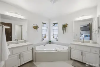 Primary Bathroom - enjoy a nice soaking tub and dual vanities!