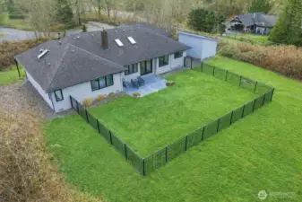 The 1.2 acres of property goes well beyond the fenced area!