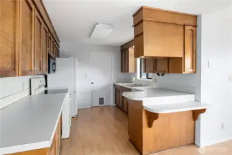Galley Kitchen with all appliances.