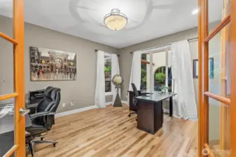 Office with extended hard wood floors