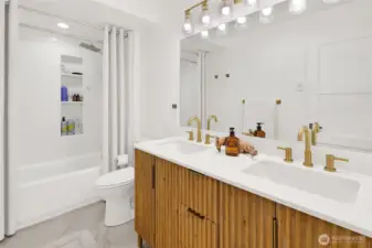 Updated primary bathroom with modem finishes. Clean, refreshed design with attention to details.