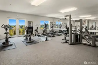 Penthouse-level community fitness room with views of downtown.
