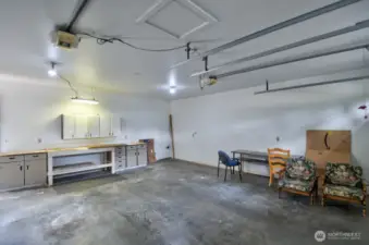 Detached 2 car garage in addition to shop parking