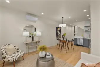 Living, dining, and kitchen areas flow seamlessly, perfect for relaxing evenings or weekend hosting.