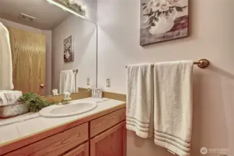 Half bath conveniently located on the first floor for guests.