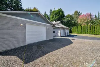 View from the shop towards the house. Total covered parking would be 5 cars!