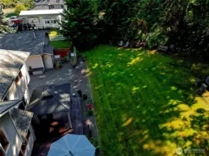 The partially fenced yard feels private.