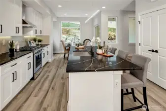 Kitchen with eating space (photos from model home)