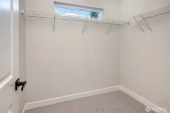 Big Walk-in closet in primary bedroom (photos from model home)