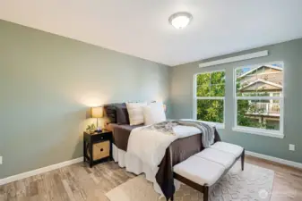 The primary suite has a spacious bedroom, bath and walk-in closet.