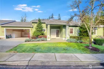2-car attached garage with epoxy flooring   and custom cabinets