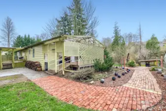 This is a covered deck off the primary bedroom. There are three decks- two covered, one uncovered.