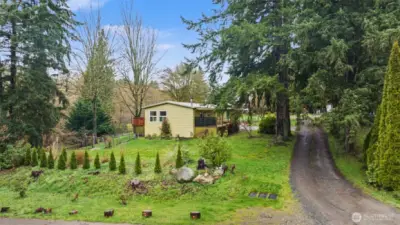 View from the main road. Shared driveway with home behind.