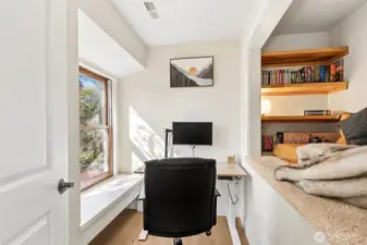 Walk-in closet currently configured as an office nook, with easy conversion back.