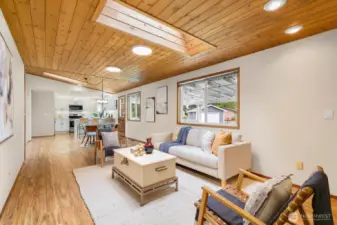 More wood-lined ceilings + skylights to let in natural light.