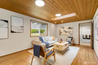 Family room / bonus area sits off laundry & 3/4 bath - also entrance to garage.