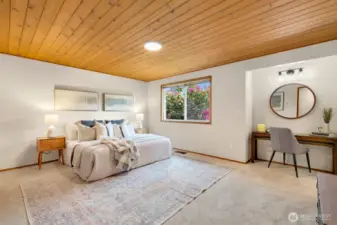 Large primary suite sits at back of house.