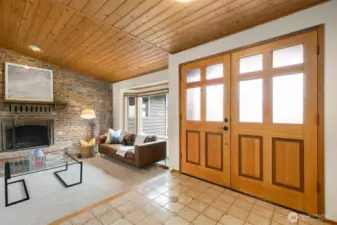 Welcome home! Stunning, vaulted, wood-lined ceilings and look at that door!