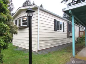 LOT RENT IS ONLY $660. P/M, HOME HAS BUILT-IN WALL A/C UNIT IN LIVING ROOM., NORTH SIDE OF HOME.