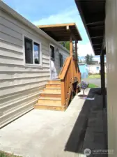 COMING FROM BACK YARD AREA TO FRONT DECK.