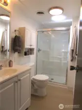 BATHROOM HAS BEEN UPDATED W/ WALK IN SHOWER & VANITY, SKYLIGHT ADDED FOR LIGHTING.