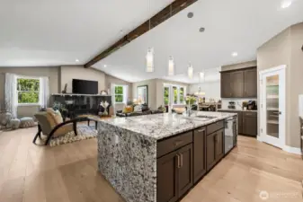 The spacious great room, the dining room and the kitchen are all in perfect symmetry.  You'll love the casual luxury of this thoughtfully built home