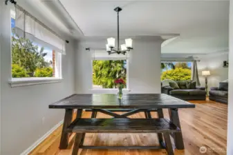 Sun-filled windows framing picturesque landscaping create such a peaceful ambiance, while a spacious dining room sets the perfect stage for gatherings, laughter, and memorable meals.