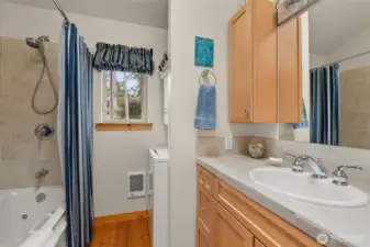 Full bath and compact laundry, east facing