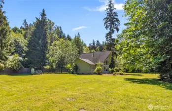 Huge, open, sunny yard, ready for play, garden, entertaining in style.