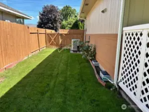 South side fenced yard
