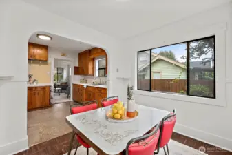 Step into this charming dining area that overlooks the back yard.
