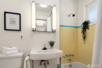 En-suite full bathroom with retro tile.