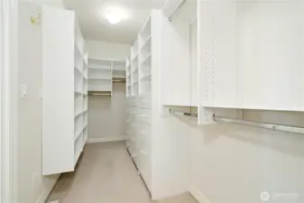 Just a small peek at the huge walk-in closet with organizers.
