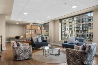 This thoughtfully designed reading and conversation nook offers a quiet retreat within the building. With built-in shelving, plush seating, and floor-to-ceiling windows, it’s an ideal spot to work, unwind, or enjoy a good book.