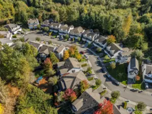 Community playground/park with nearby athletic court located a short walk across the street from unit. Community surrounded by greenbelt providing serene neighborhood views and sounds of nature.
