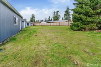 Large yard for play, garden or DADU.