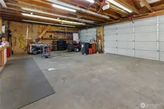 Every homeowner's dream! Large 3-car garage/shop