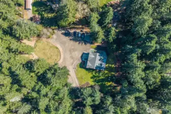 This versatile acreage is ideal for those dreaming of homesteading, entertaining, or simply enjoying a quiet, wooded escape.