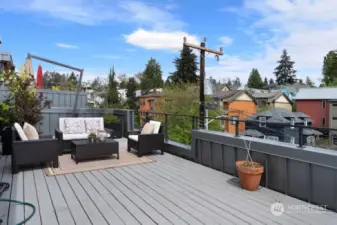 Rooftop deck with solid wood decking.