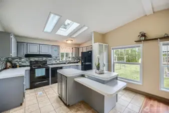 Beautifully updated kitchen is spacious and function in its design. Lots of storage throughout.