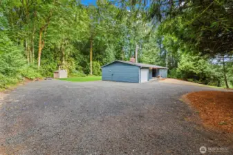 Circle drive, with a $hitload of off street parking for whatever your heart desires.
