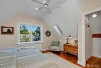 The primary has a spacious closet and a skylight for lots of natural light.