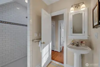 Upstairs has a 3/4 bath -- shower, toilet and sink.
