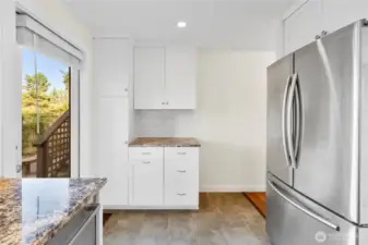 This section of the kitchen would make a terrific coffee station!